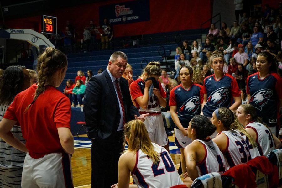 Head coach Rick Stein talks to the womens basketball team before the tip off against Western Illinois University Friday in the Screaming Eagles Arena.