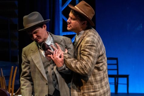 Tom Donohue (Gavin Carter) confronts Mr. Reed (Noah Harrison) after his wife dies of radium poisoning due to Radium Dials' negligence in "These Shining Lives." (Photo courtesy of USI Media)