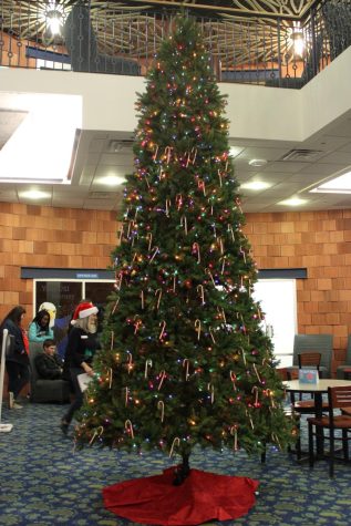 A decorated Christmas tree stands in Fireside Lounge during the Lighting a Tradition Reimagined event Friday. The event did not feature lighting a Christmas tree this year. (Photo by Bryce West)