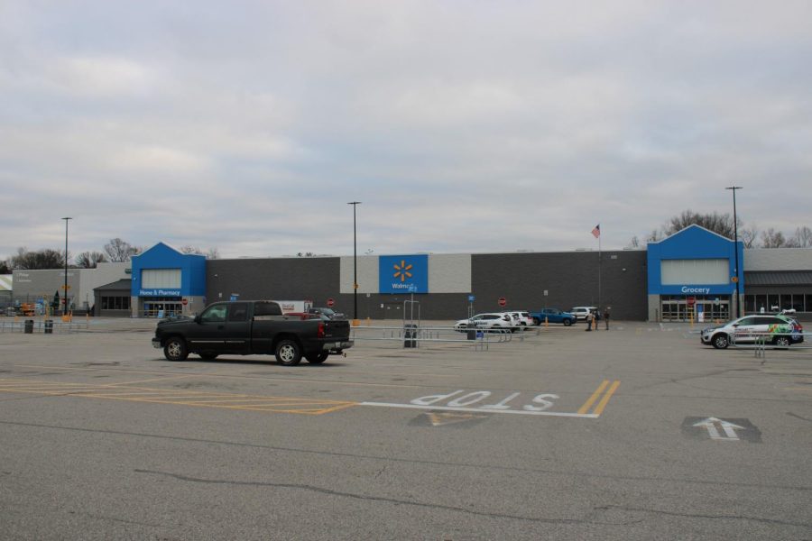 Evansville West Side Walmart parking lot remains mostly empty around 4 p.m. Friday. The store was closed Friday except for Walmart Pharmacy curbside following the shooting Thursday evening. (Photo by Bryce West)