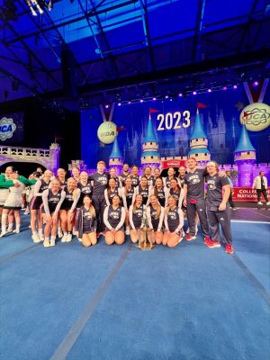The USI cheer team poses at the UCA & UDA College Cheerleading & Dance Team National Championship Jan. 15. The competition took place at Disneys Wide World of Sports Complex in Orlando, Florida. The cheer team placed fourth in nationals, which is the highest they have ranked since 2014. (Photo courtesy of Megan Ringer)