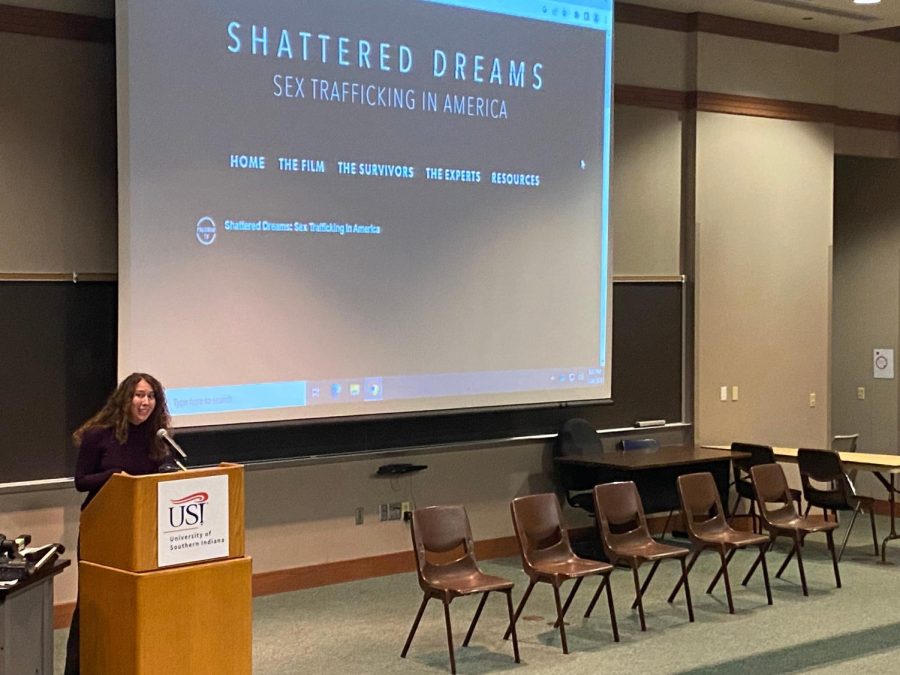 Catherine Champagne, assistant program director for Student Wellness at USI, explains the concept of the documentary Shattered Dreams: Sex Trafficking in America. The documentary was shown Tuesday at the Mitchell Auditorium in the Health Professions Center to promote National Human Trafficking Prevention Month. (Photo by Alyson Collins)
