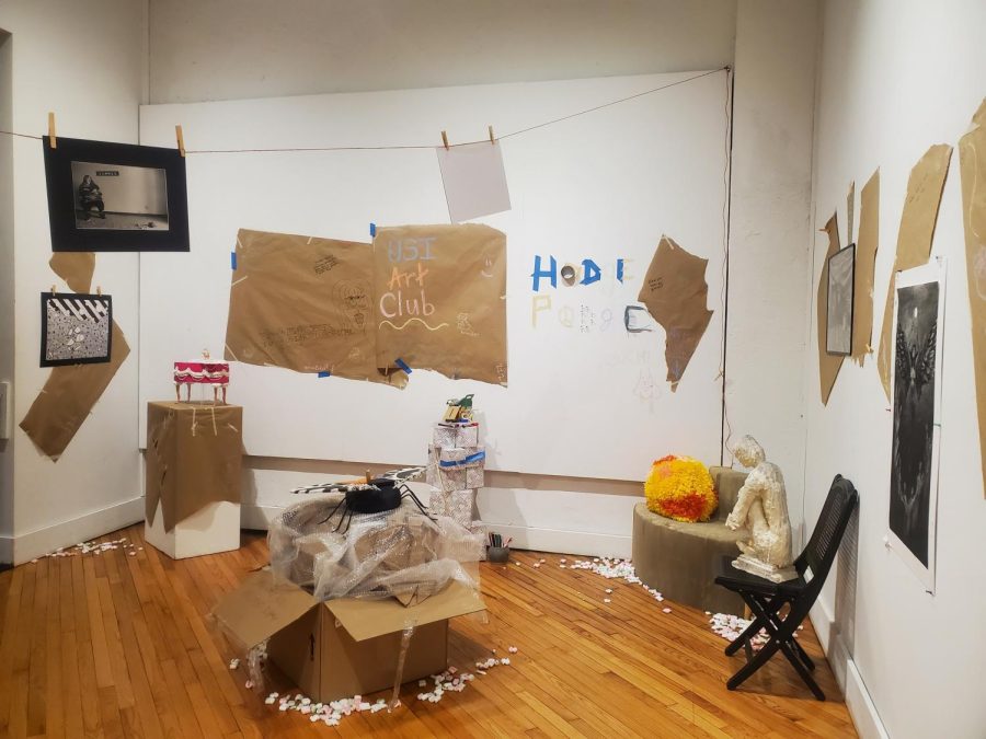 The Hodge Podge exhibition room in the New Harmony Gallery of Contemporary Art is covered in tape, paper, writings and art pieces. The gallery has been available for viewing in the NHGCA since Jan. 31 and will remain open through Feb. 25. (Photo courtesy of Tonya Lance)
