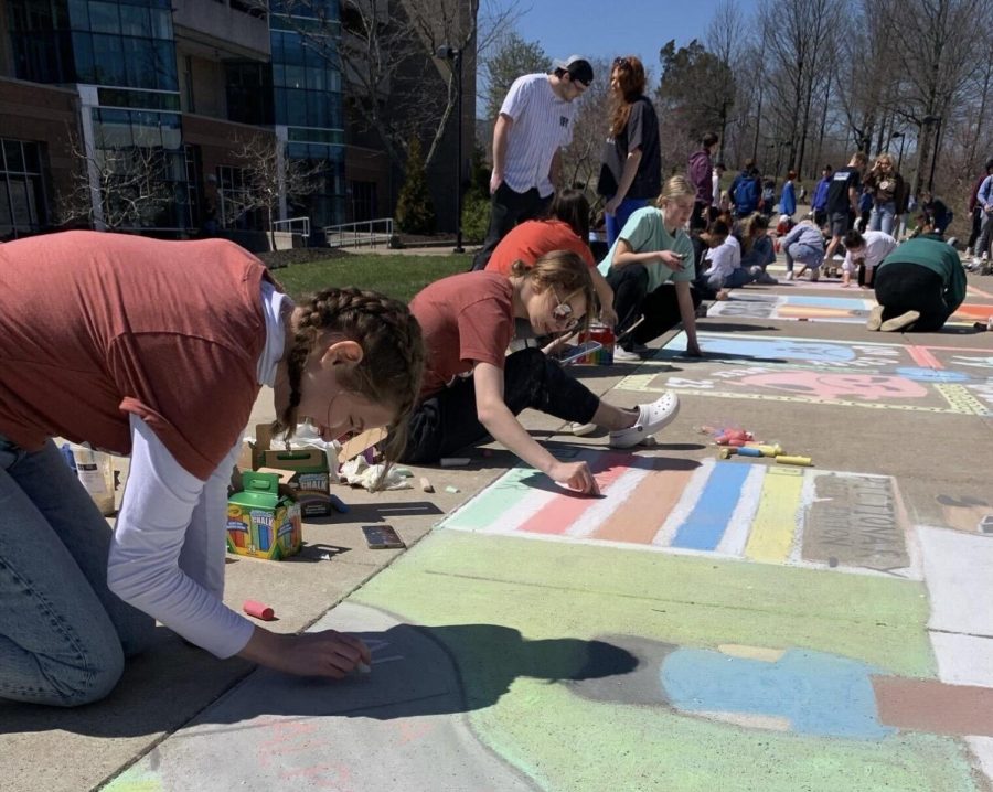 Members of USI’s Greek Life participate in a chalk mural competition Wednesday outside University Center West. The event was held as a part of Greek Week. (Photo courtesy of Molly Durchholz)
