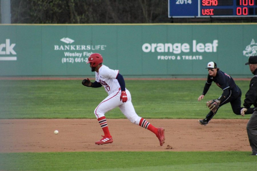Daniel Lopez, junior infielder, runs to third base Thursday in the game against Southeast Missouri State University at the USI Baseball Field.