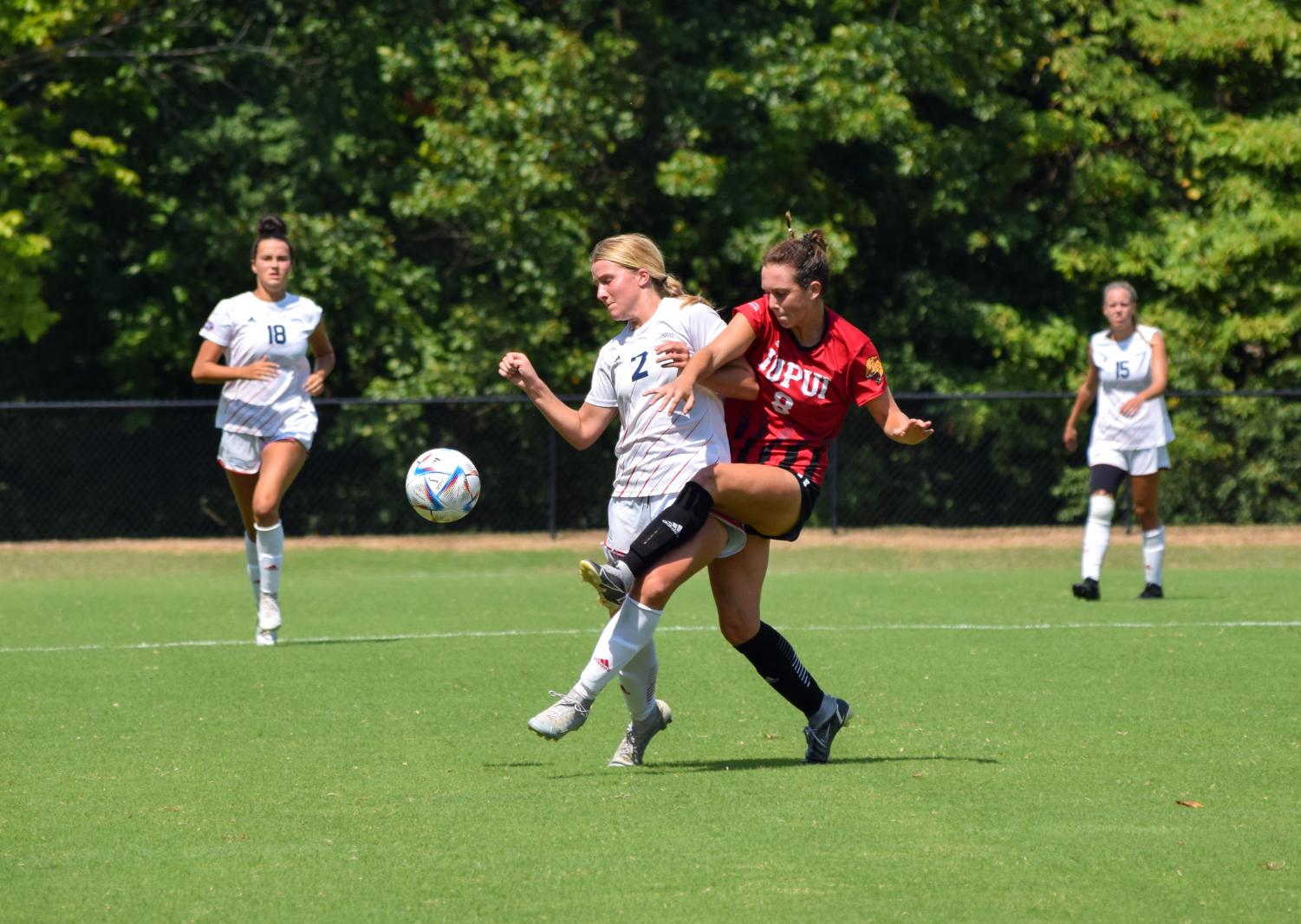 Emma Thurston, freshman midfielder, defends a pass from an Indiana University-Purdue University Indianapolis midfielder Sept. 5, 2022.