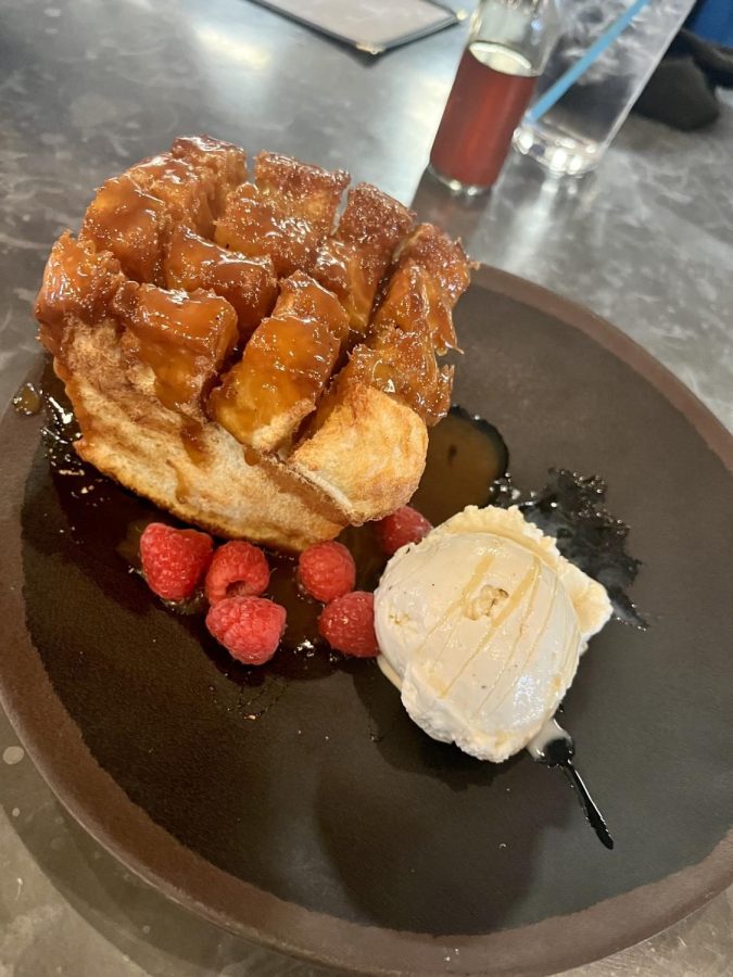 The honey toast at 2nd Language features a warm loaf of crispy-crunchy toast, warm miso syrup, fresh seasonal fruit and vanilla gelato April 1. (Photo by David Graber)