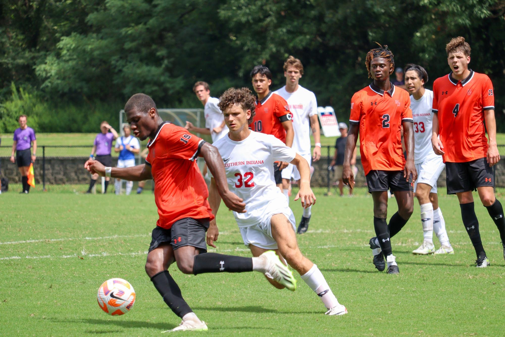 Danik Marynevych, freshman forward, fights for control of the ball Sunday in the game against Mercer University at Strassweg Field. 