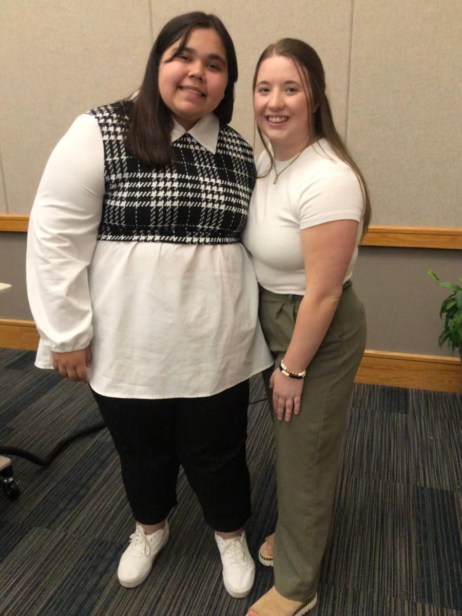 Adrianna Garcia, 2023-2024 president of the Student Government Association, and Taegan Garner, 2023-2024 president of the Student Government Association, smile together after Garcia's inauguration Wednesday in Carter Hall. 