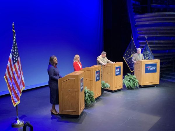 Mayoral candidates Democrat Stephanie Terry, Republican Natalie Rascher and Libertarian Michael Daugherty answer questions drawn by John Gibson, WNIN radio host, at the Evansville Mayoral Debate Wednesday in the Performance Center. (Photo by Anthony Rawley)