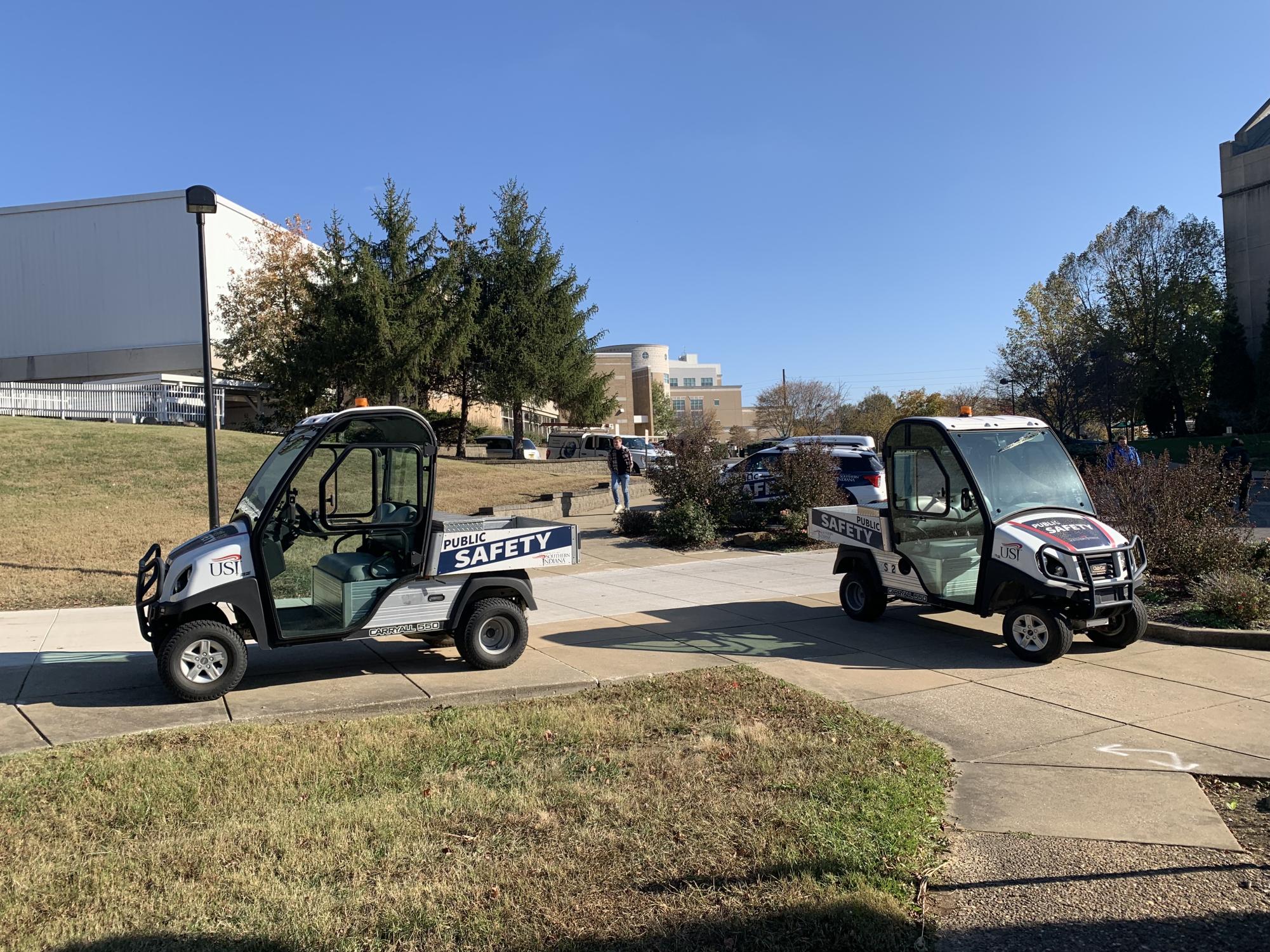 Public Safety vehicles park in front of the Public Safety building. Public Safety maintains patrol vehicles across campus. (Photo by Anthony Rawley)