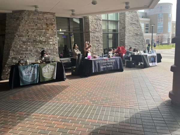 Various tables set up for the Social Justice Activism Fair Wednesday in the University Center Breezeway. 