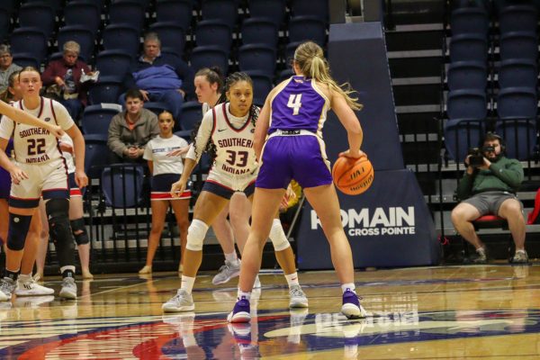 Triniti Ralston, freshman guard, guards a Western Illinois University player Thursday in the Screaming Eagles Arena. (Photo by Peyton Peters)