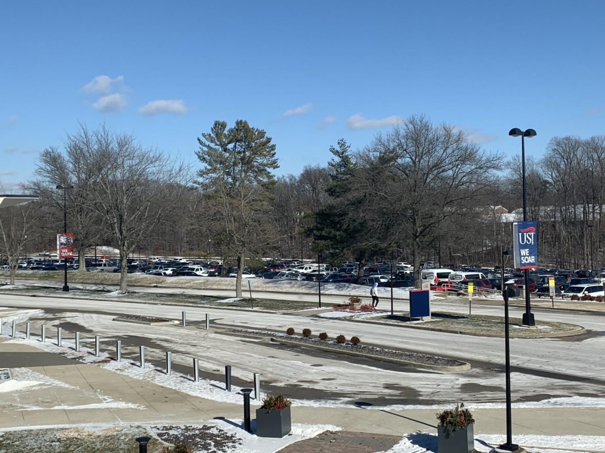 Vehicles park in Lot C. Students have expressed concerns regarding campus parking availability. 