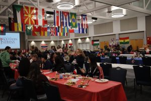 Attendees eat food from various cultures at the International Food Expo Friday in Carter Hall. (Photo by Alyssa DeWig)