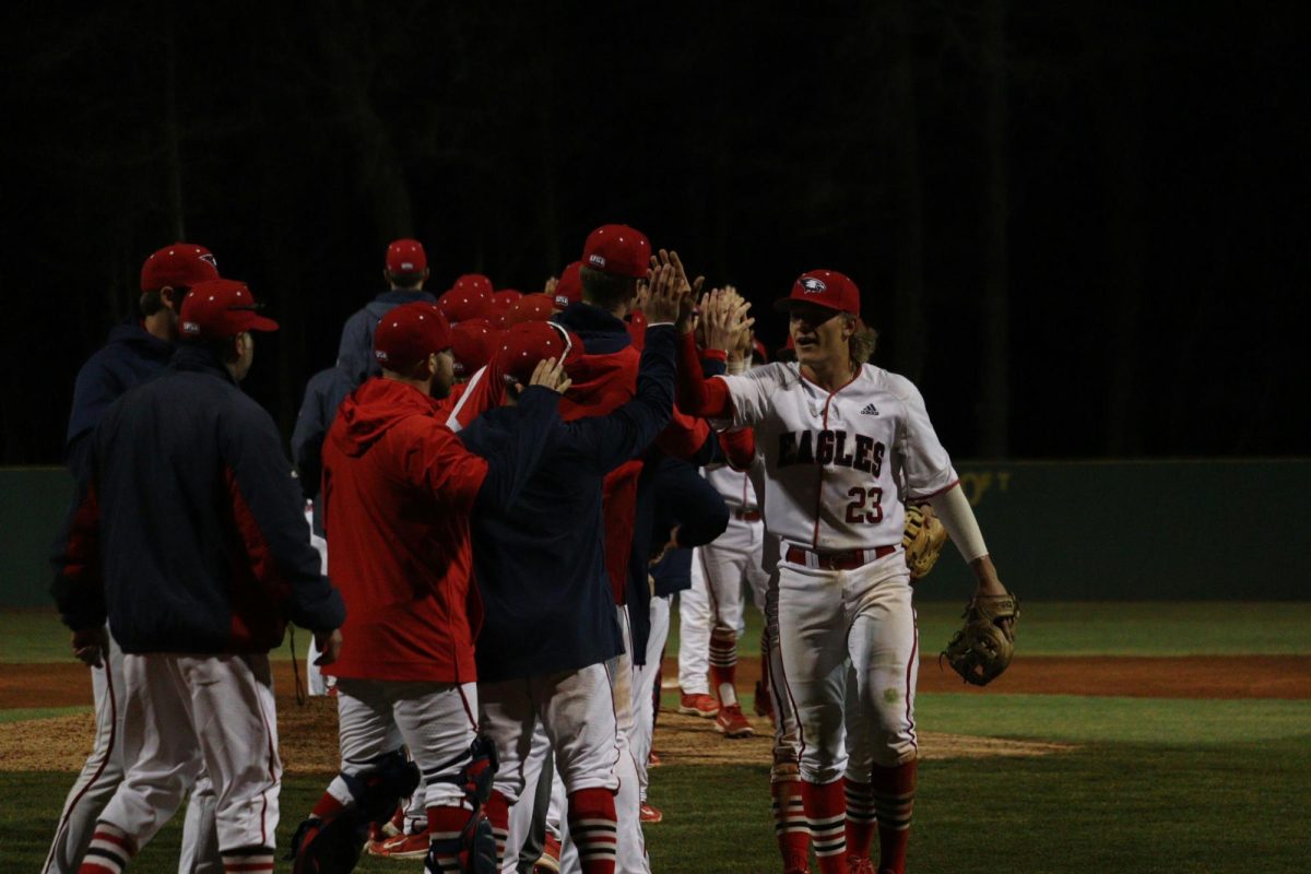 The+baseball+team+celebrate+its+victory+against+Eastern+Michigan+University+Friday+at+the+USI+Baseball+Field.+%28Photo+by+Will+Kessinger%29