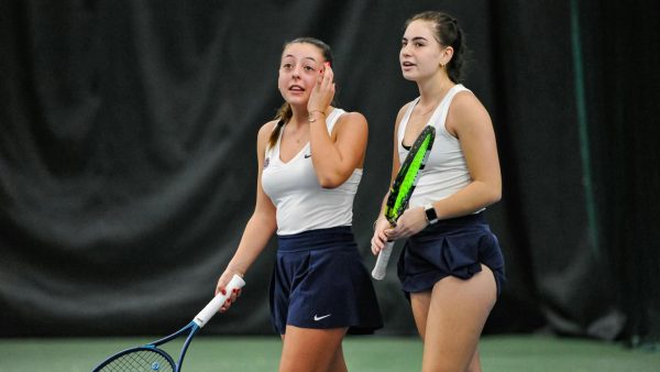 Sofia Davidoff, freshman biology major, and Antonia Ferrarini, freshman marketing major, participate in doubles Saturday at the Evansville Tennis Center. An interesting duo, Davidoff hails from Lagny-sur-Marne, France, while Ferrarini comes to Southern Indiana from Caxias do Sul, Brazil. (Photo courtesy of Nathanial Barbee and USI Athletic Communications)