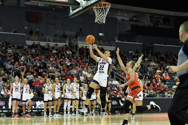Meredith Raley, senior forward, drives to the basket in the Ohio Valley Conference Championship March 9. (Photo by Elizabeth Randolph and USI Athletic Communications)