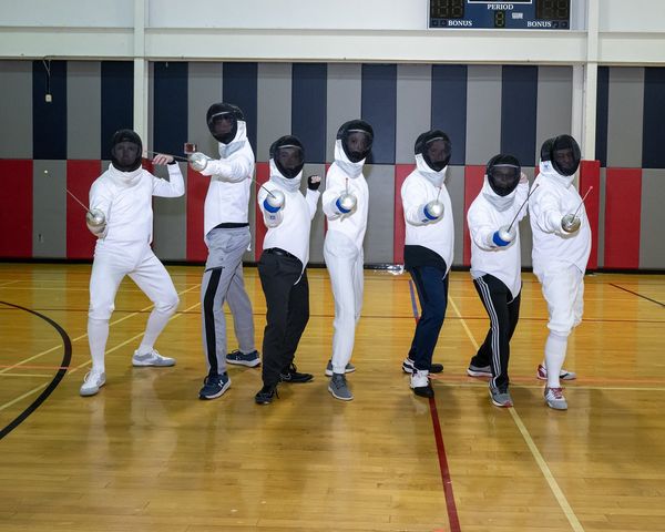 The Fencing Club open to all students, practices proper fencing technique