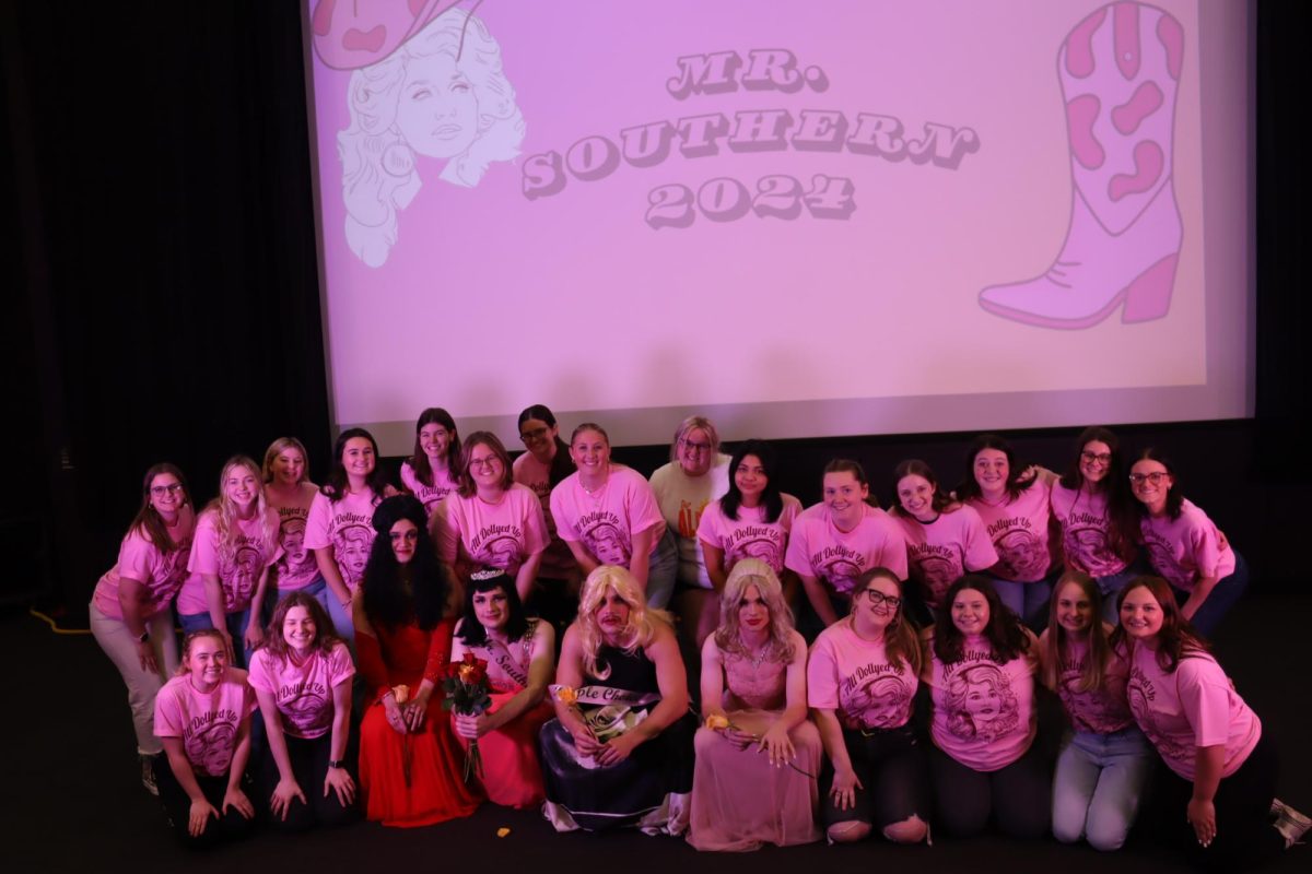 Alpha Sigma Alpha poses with the contestants of Mr. Southern March 22 in Forum I. Alpha Sigma Alpha hosted the drag show event.