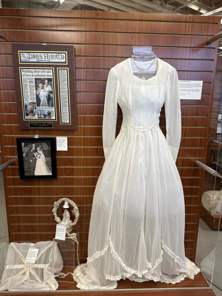 Archives Madness is a yearly contest held by the University Archives and Special Collections in collaboration from area institutions competing for recognition for having the coolest artifact. This years winner was the Parachute Dress submitted by the Evansville Wartime Museum.