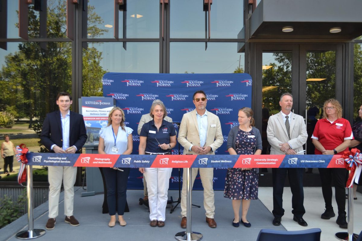 USI staff and faculty cut the ribbon in front of the RFWC to celebrate the expansion of the building Tuesday.