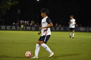 Ahiro Nakamae, freshman midfielder, possesses the ball, moving it up the pitch Saturday at Strassweg Field. (Photo by Grace Michell)