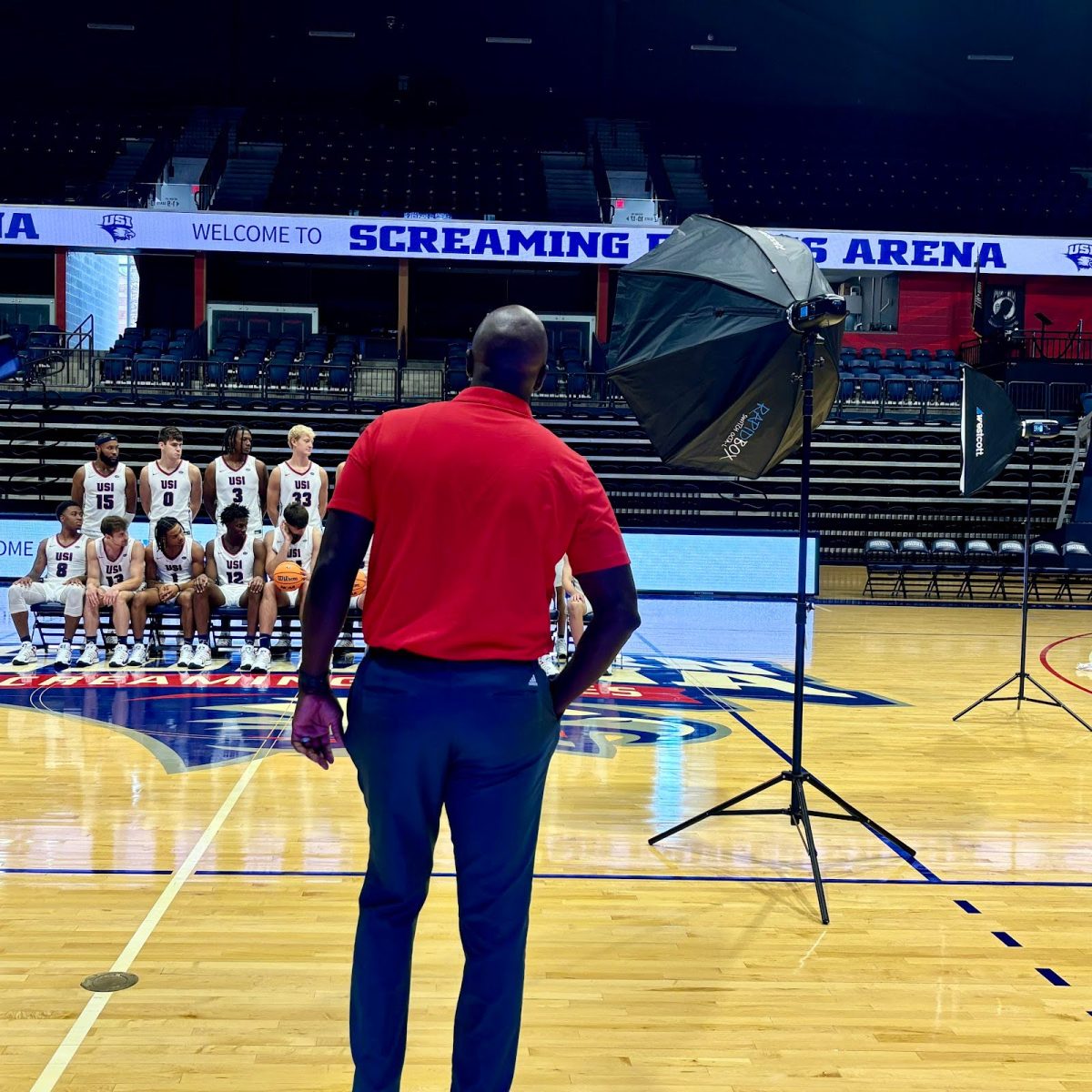 Stan Gouard, men’s basketball head coach, stands across from members of the men’s basketball team during Media Day Sept. 18 at the Screaming Eagles Arena. (Photo by Will Kessinger)
