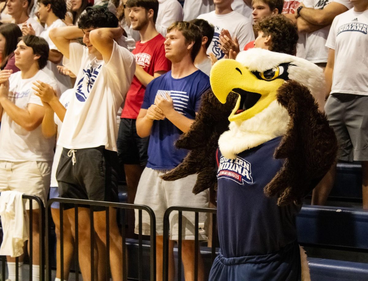 Archie the Eagle cheers as he stands amongst the student section at the USI vs UE Women’s Volleyball game last Friday night at Screaming Eagles Arena. (Photo by Izzy Hannon)
