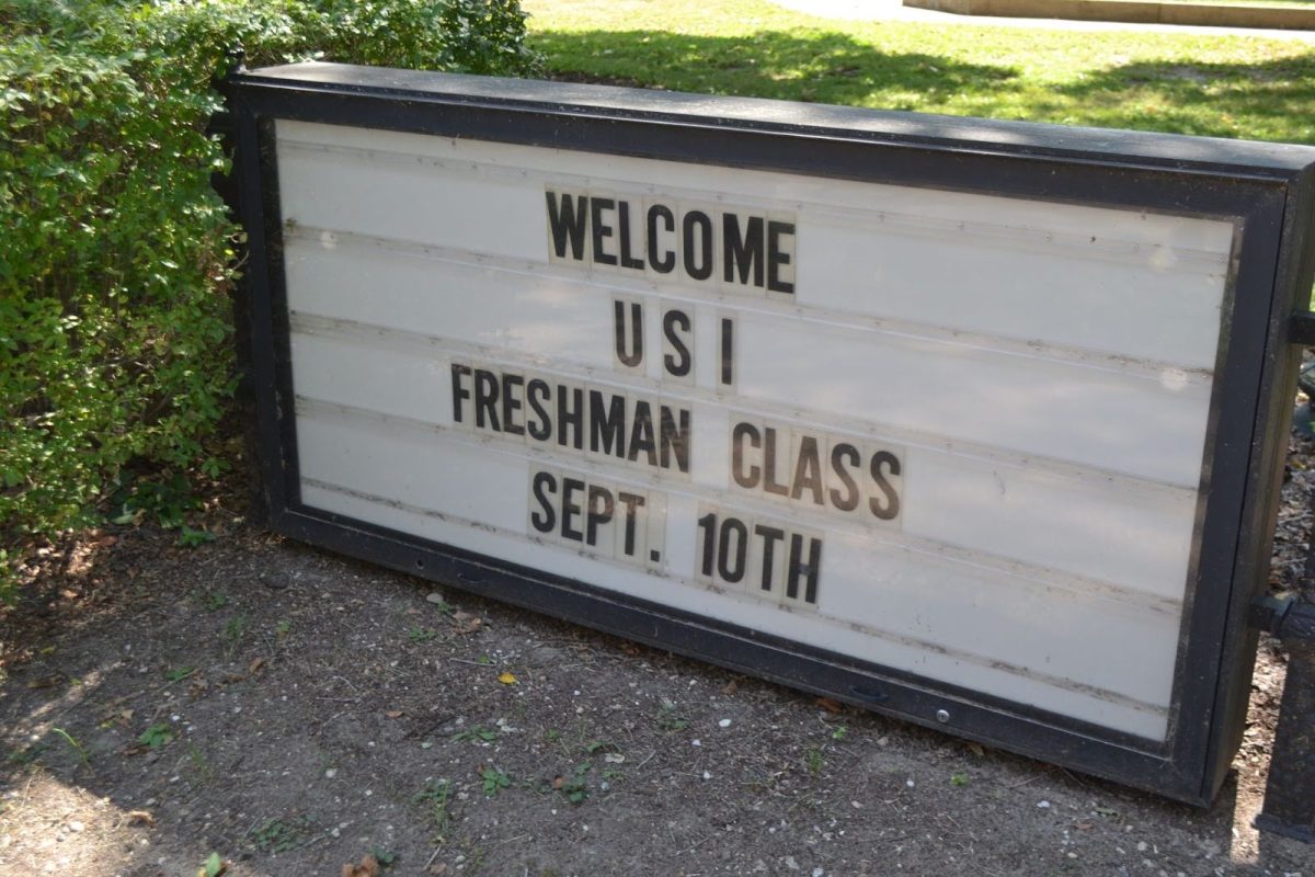 Signage beside the Murphy Auditorium greets students to New Harmony Tuesday. USI faculty and New Harmony locals welcomed the freshman class to New Harmony as part of the UNIV 101: Screaming Eagle Experience class.