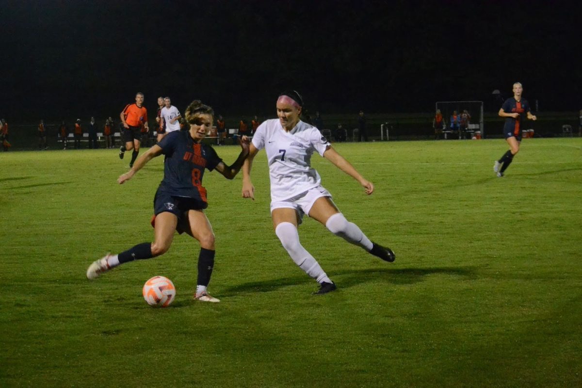 Adriana Berruti, senior midfielder, clashes with a UT Martin player for possession of the ball Thursday at Strassweg Field. (Photo by Alex Mendoza)
