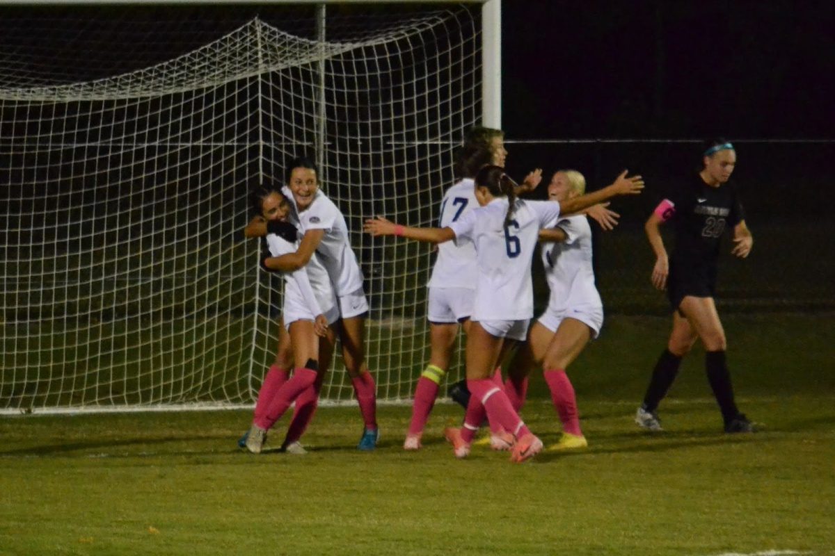 The Screaming Eagles celebrate the first and only goal of the game Thursday at Strassweg Field. (Photo by Alex Mendoza)
