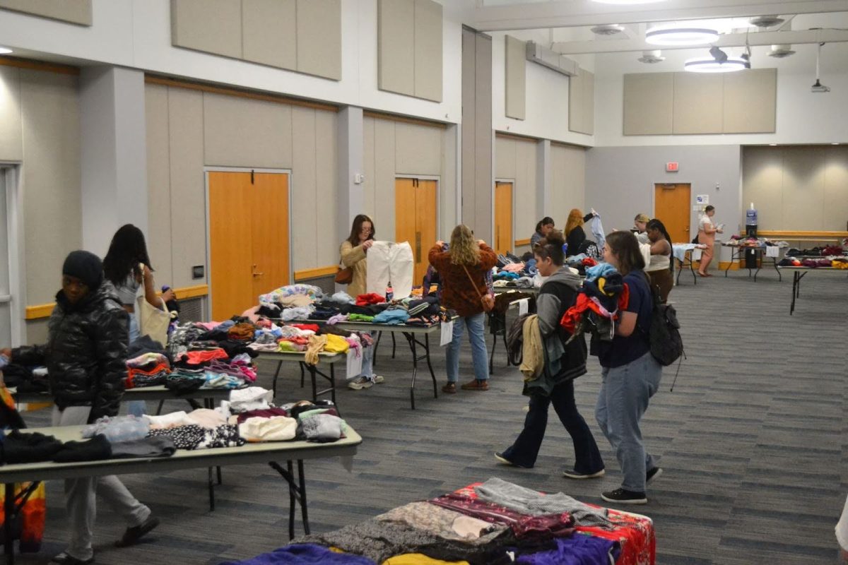 Students look through clothes Oct. 9 at Carter Hall in University Center West.