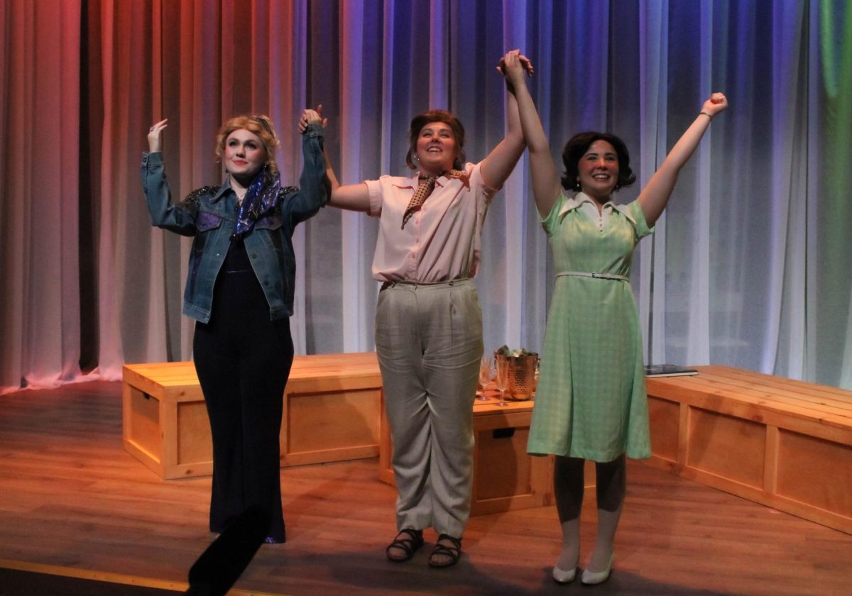 Jade Griffy, Rayn Miller and LillyBea Ireland take their bows during the dress rehearsal of "Vanities” Sept. 24 at the USI Mallette Studio Theatre.