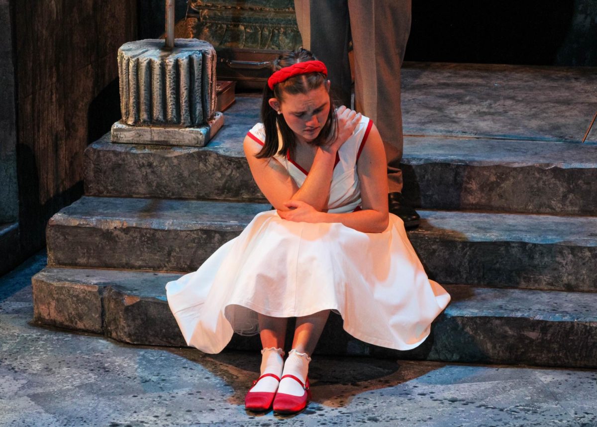 Eurydice (Jaden Crouch) sits at her father’s feet in the Underworld during the USI Theatre Program’s rehearsal of “Eurydice” Oct. 16 in the Performance Center.