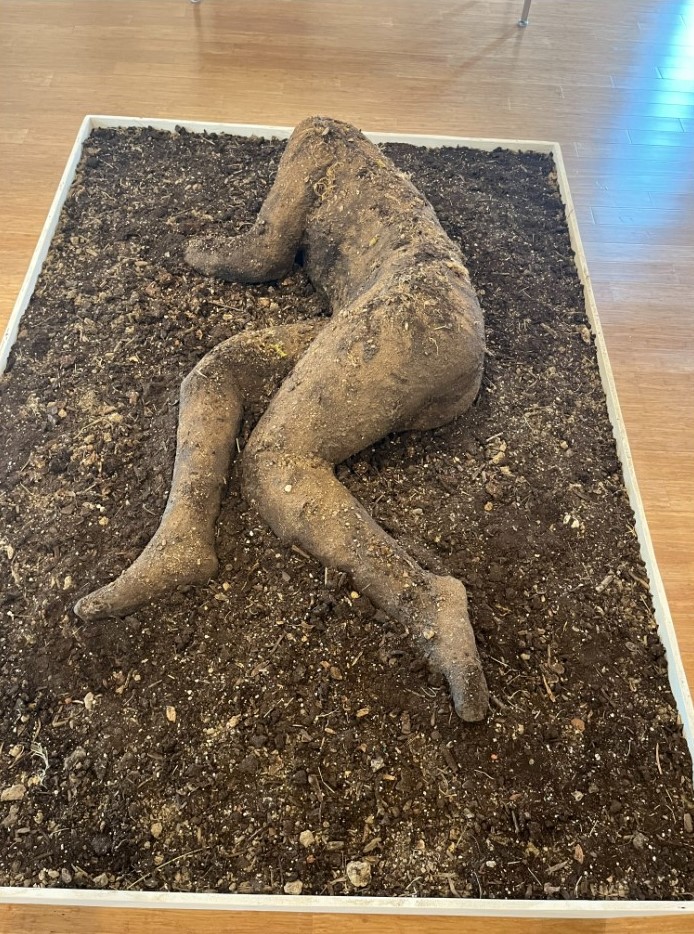 Brooke Shaden’s life-sized sculpture “Emergence” is displayed in the “Samsara” collection Sept. 24 in Kenneth P. McCutchan Art Center Gallery 1. Made from dirt, moss, plaster and resin, this piece represents our inevitable return to earth.