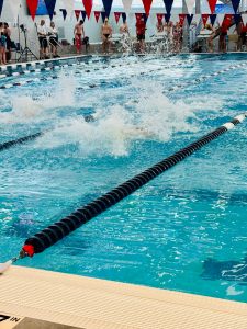 Swimmers from USI and Valparaiso University race to the finish line during the competition Thursday at the USI Aquatic Center. (Photo by Will Kessinger)
