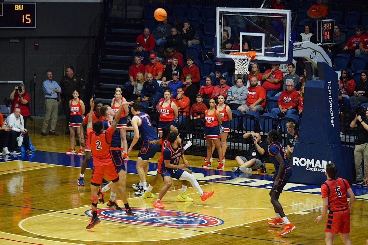 Jayland Randall, junior guard, fires a mid-range jumper Thursday in Liberty Arena. (Photo by Alex Mendoza)