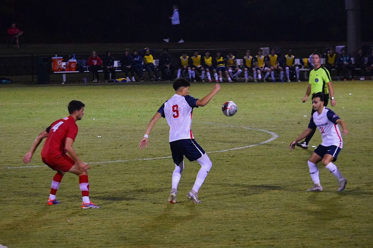 David Davila, freshman forward, gains possession of the ball Thursday at Strassweg Field. (Photo by Alex Mendoza)
