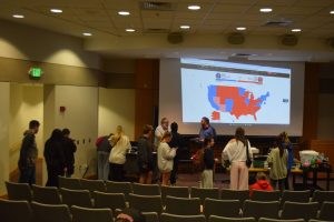 Students line up for pizza and refreshments Thursday in Kleymeyer Hall.