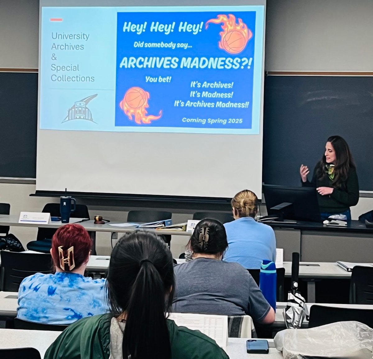 Ella Avolio-Alschbach informs SGA members of the Archive Madness event last Thursday at the College of Liberal Arts. (Photo by Cade Smithson)