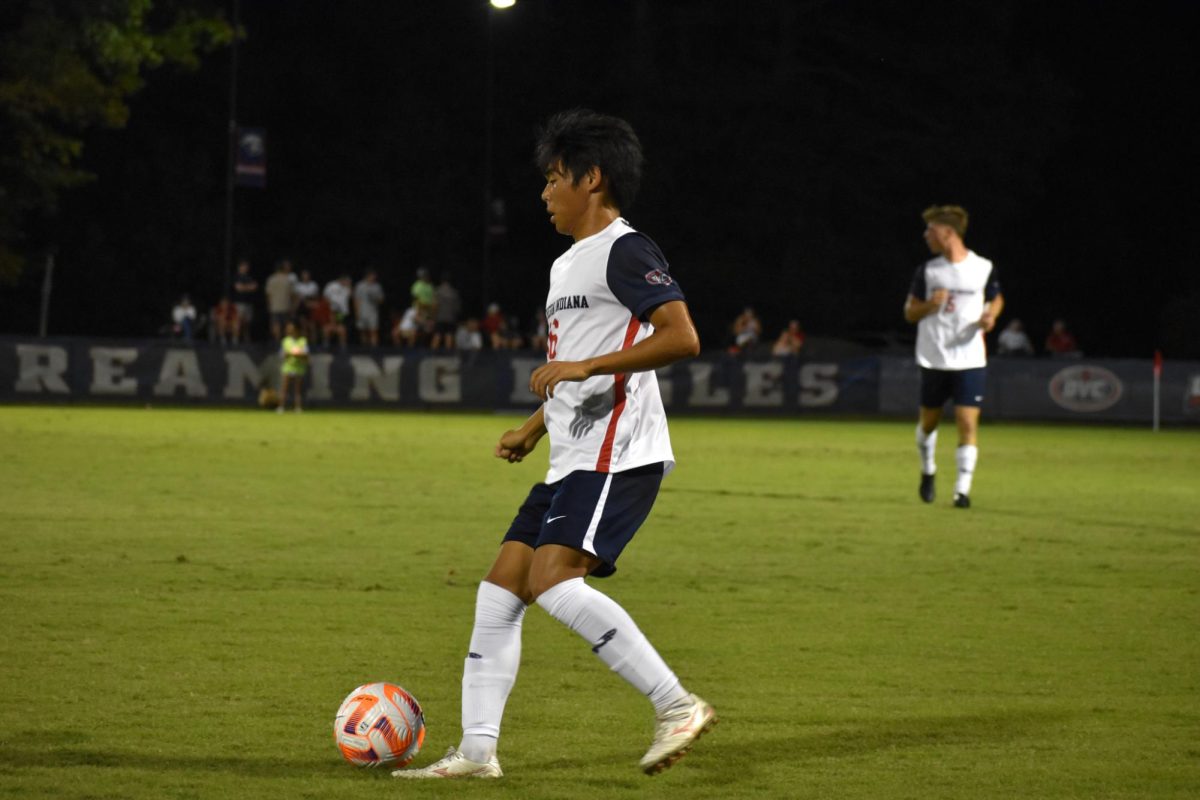 Ahiro Nakamae, freshman midfielder, dribbles the ball up the pitch against Bellarmine University Sept. 14 at Strassweg Field. (Photo by Grace Michell)