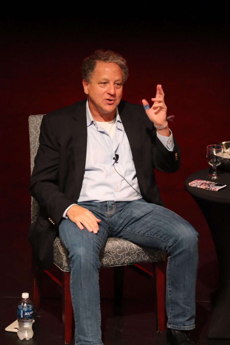 David Siminoff talks to attendees about artificial intelligence in the business industry Monday in the Performance Center. (Photo by Cade Smithson)