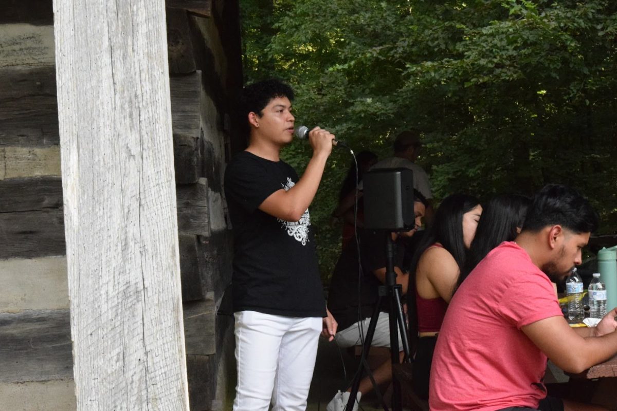 Fernando Jaen, junior biology major,  introduces himself as the president of Iclub during iclub picnic Friday, Aug. 29 at Eicher Barn.