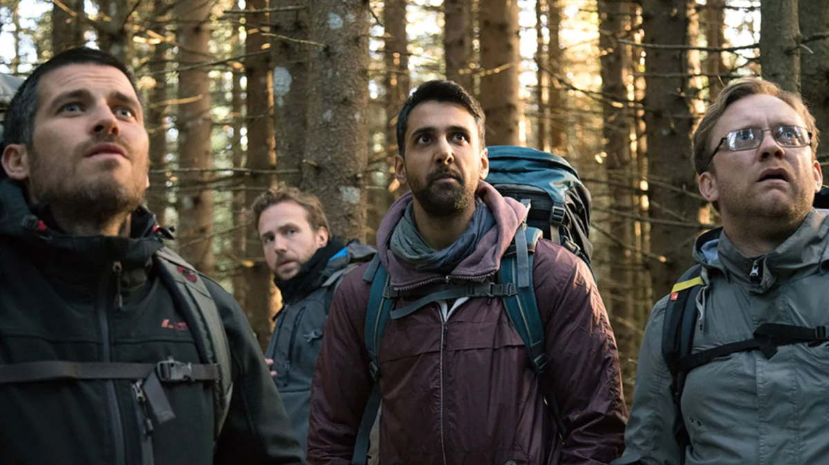 The four main characters of “The Ritual” (2017) stand in the woods.