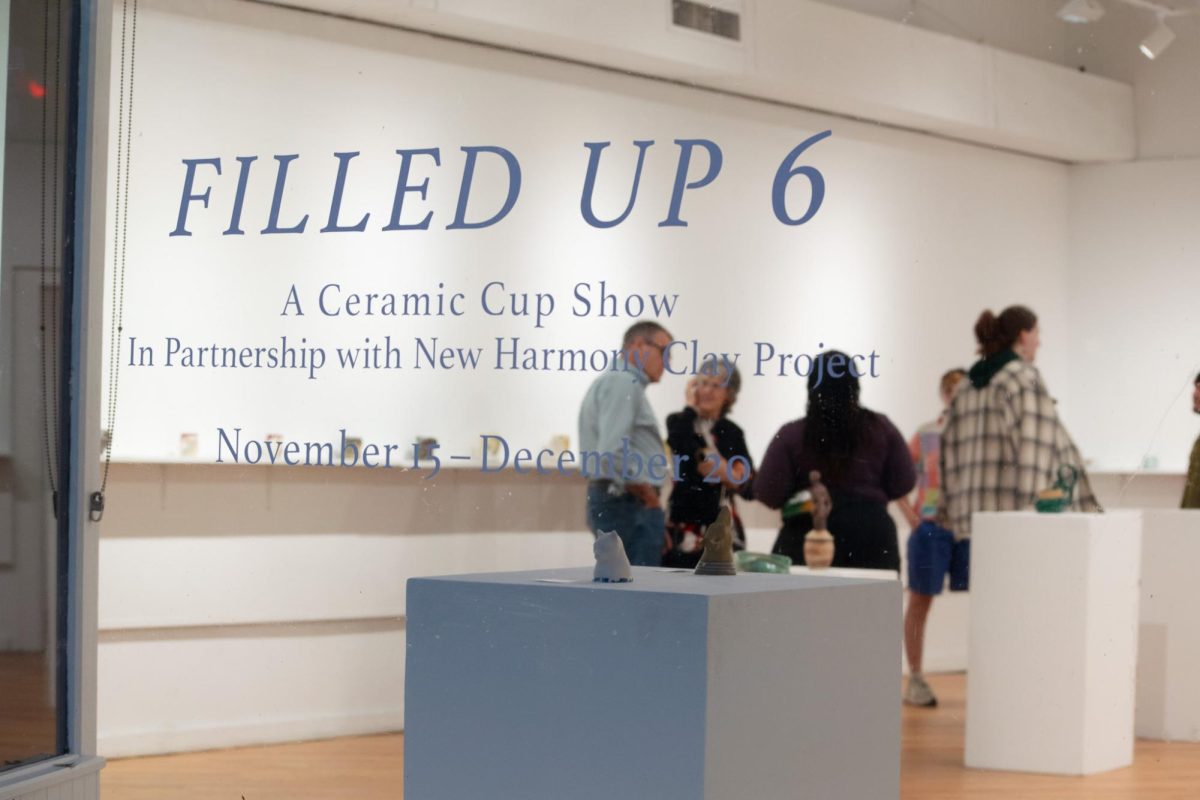 Attendees converse at the opening reception for “Filled Up 6: A Ceramic Cup Show,” Saturday, Nov. 15, at the New Harmony Gallery of Contemporary Art in New Harmony, Indiana.