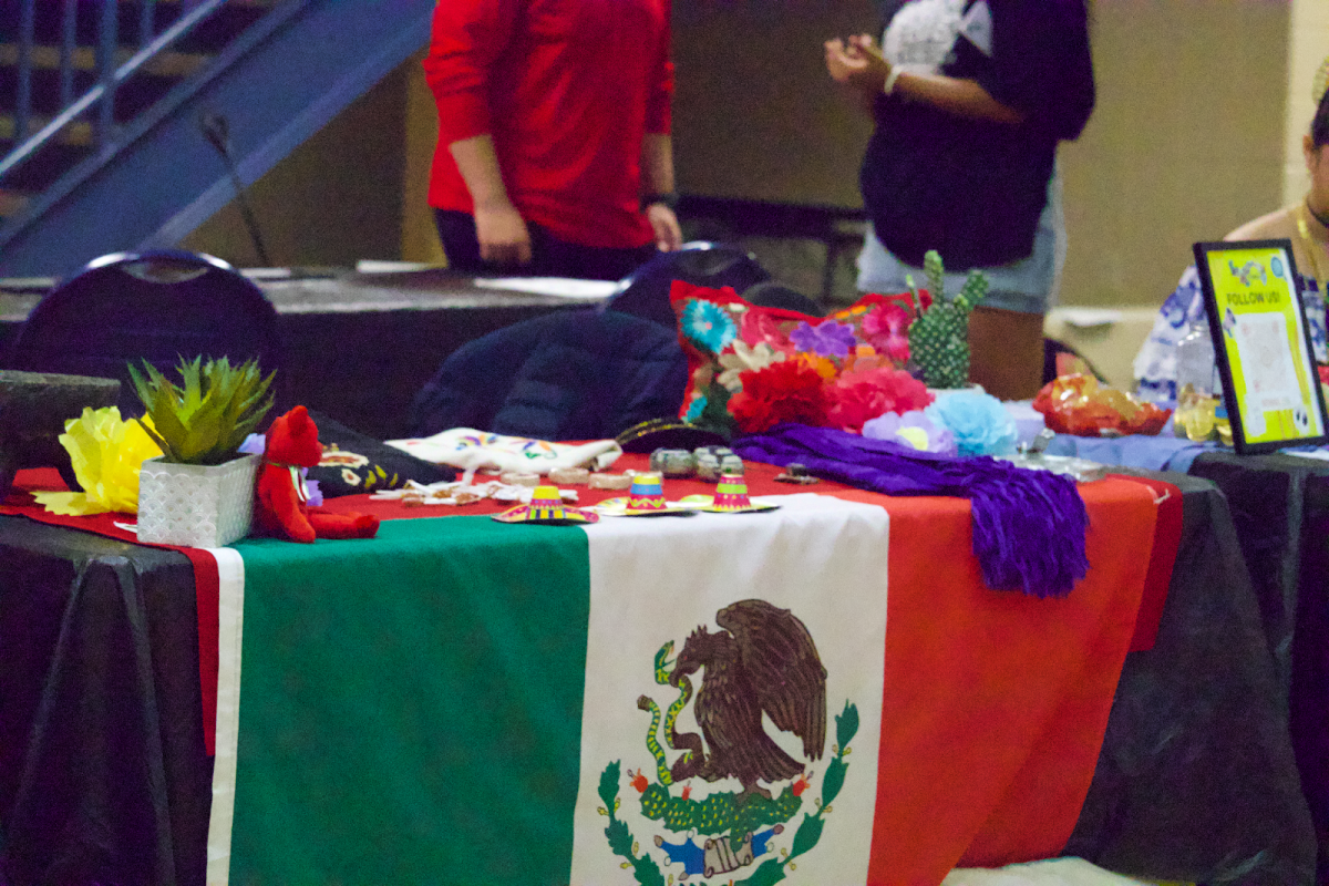 The Mexico table showcases its items at the International Extravaganza Friday, Nov. 21, in the Recreation, Fitness and Wellness Center court.