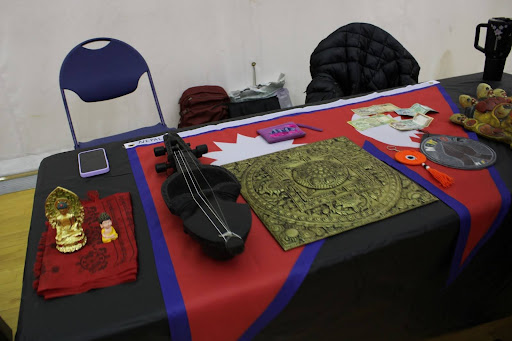 The Nepal table showcases its items at the International Extravaganza Nov. 21, in the Recreation, Fitness and Wellness Center court.