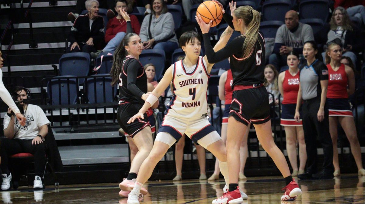 Sarang West, senior guard, plays tight defense against a Southern Illinois University Edwardsville player Saturday, Jan. 31, at Liberty Arena. (Photo by Anderson Schmidt)
