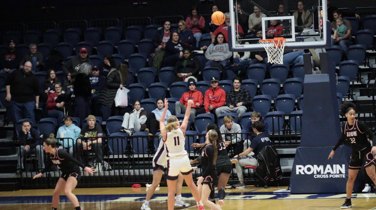 Ali Saunders, senior guard, shoots a jump shot from the free throw line against Southern Illinois University Edwardsville Saturday, Jan. 31, at Liberty Arena. (Photo by Anderson Schmidt) 
